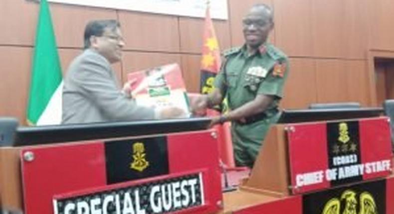 The Chief of Policy and Plans, Nigerian Army, Lt.-Gen. Lamidi Adeosun and the Deputy Director, Export, Indian Ordnance Factory Board, Prakash Agarwala, during a courtesy visit to Army Headquarters in Abuja on Tuesday 18/2/2020 (NAN/Sumaila Ogbaje)