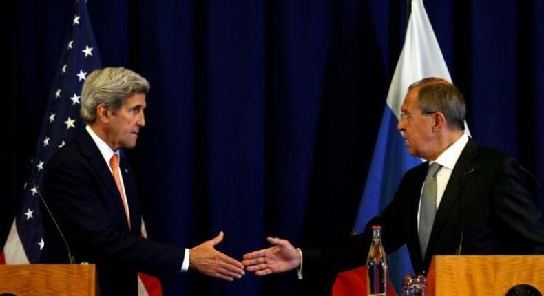 U.S. Secretary of State John Kerry and Russian Foreign Minister Sergei Lavrov (R) shake hands at the conclusion of their news conference following their meeting in Geneva, Switzerland where they discussed the crisis in Syria on September 9, 2016.