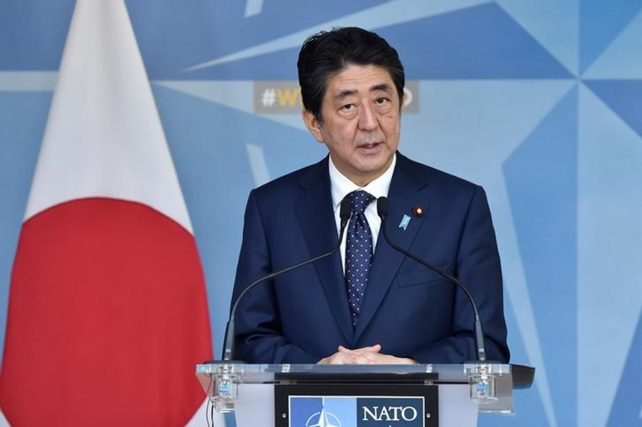 Japanese PM Abe and NATO Secretary General Stoltenberg deliver joint statements to the media in Brussels