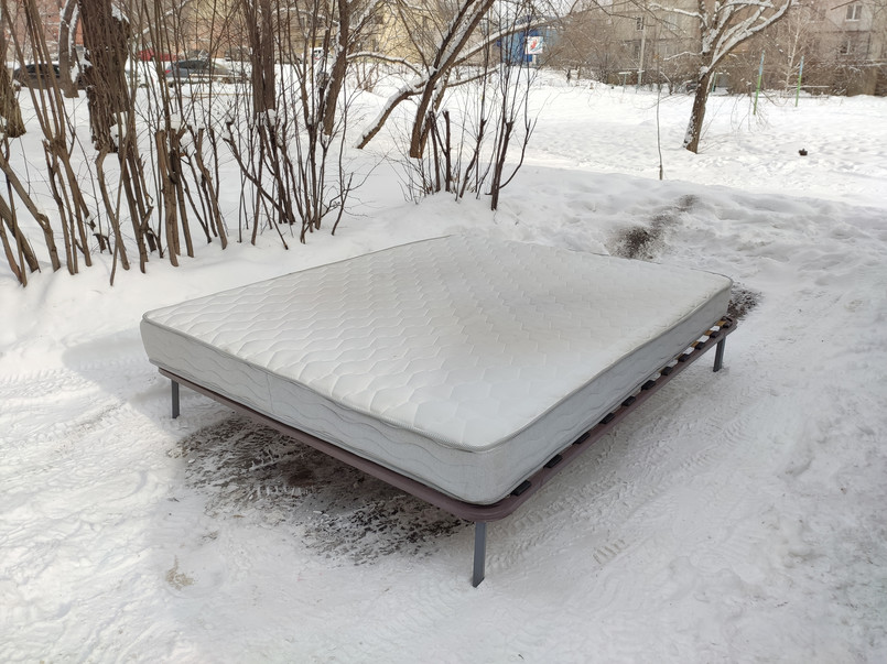 In,Winter,There,Is,An,Old,White,Mattress,On,The