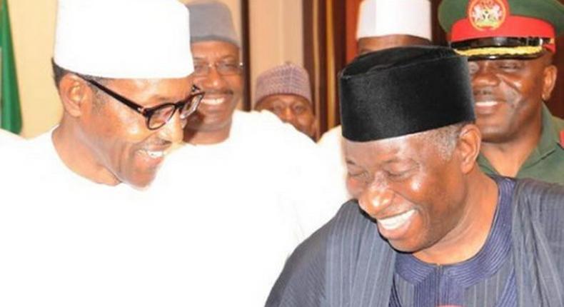 President Goodluck Jonathan and Gen. Muhammadu Buhari share a good laugh