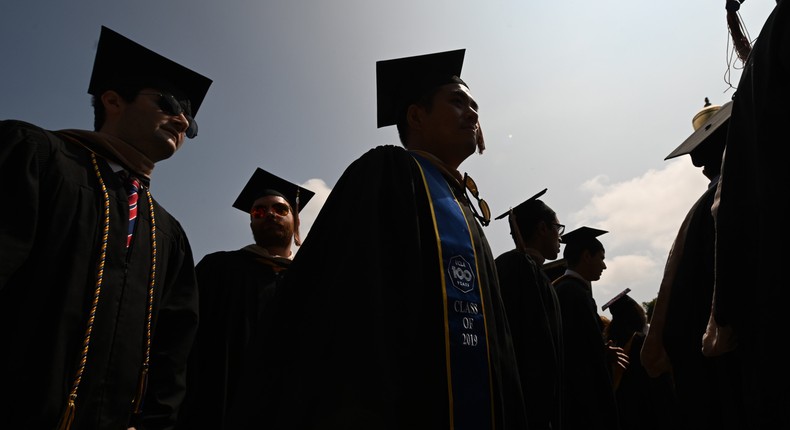 College graduates.Robyn Beck/AFP via Getty Images