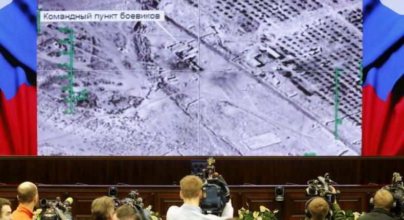 Journalists attend a briefing at the headquarters of Russia's defence ministry in Moscow, Russia, December 25, 2015.