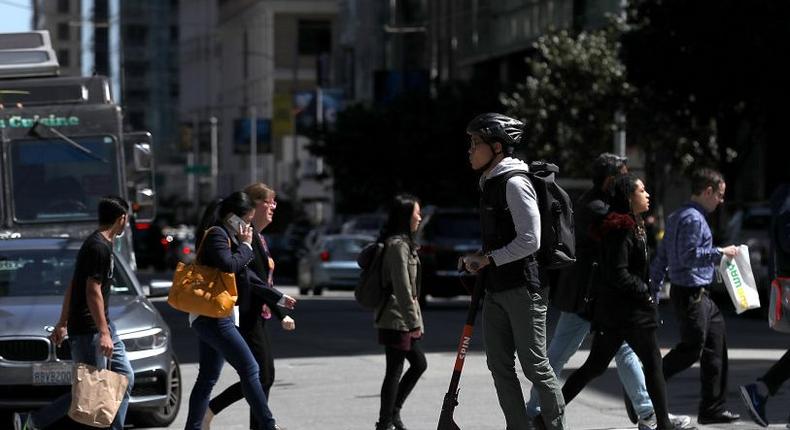 A user rides a Spin scooter on April 17, 2018 in San Francisco, California.