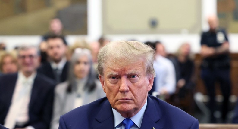 Former U.S. President Donald Trump appears in the courtroom with his lawyers for the start of his civil fraud trial at New York State Supreme Court. Brendan McDermid-Pool/Getty