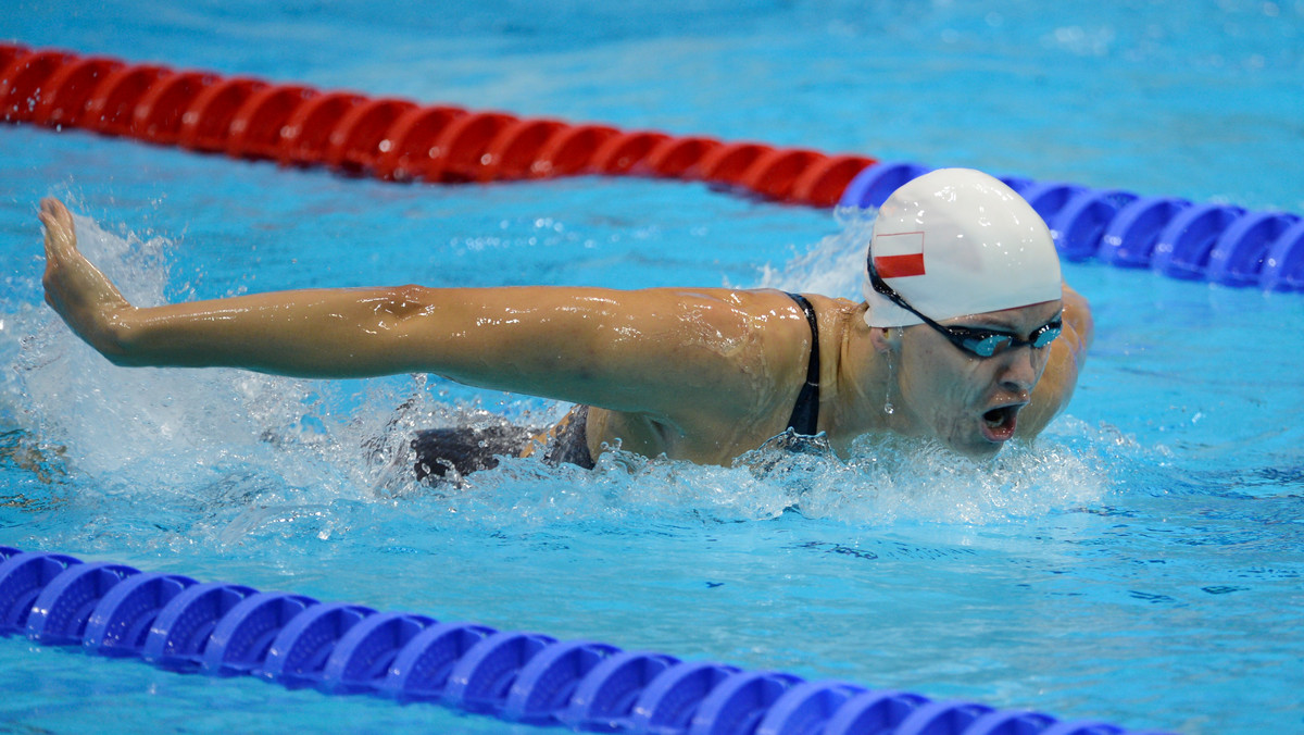 Otylia Jędrzejczak nie może uwierzyć w to co się stało, 200 metrów motylkiem to był jej koronny dystans, po ostatnim występie na igrzyskach olimpijskich w Londynie, niestety nie było tego widać...