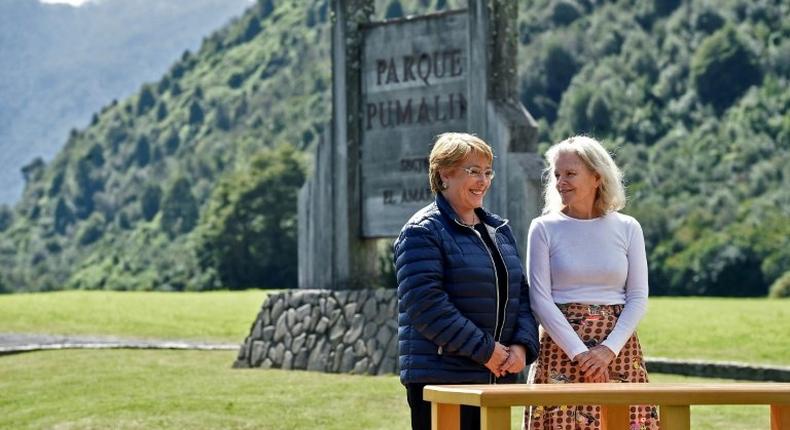 Chilean President Michelle Bachelet (left) and Kristine McDivitt Tompkins signed the land donation document at Parque Pumalin, on March 16, 2017