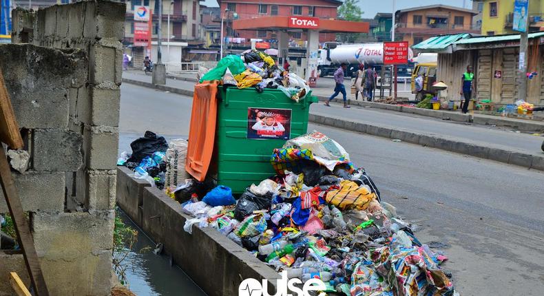 Waste often overflows into drainage channels in Lagos