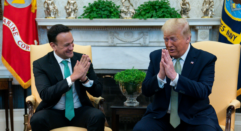 President Donald Trump and Irish Prime Minister Leo Varadkar joke about not shaking hands during a meeting in the Oval Office of the White House, Thursday, March 12, 2020, in Washington.