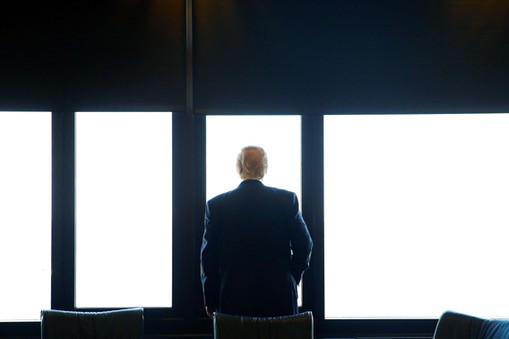 Republican U.S. presidential nominee Donald Trump looks out at Lake Michigan during a visit to the M