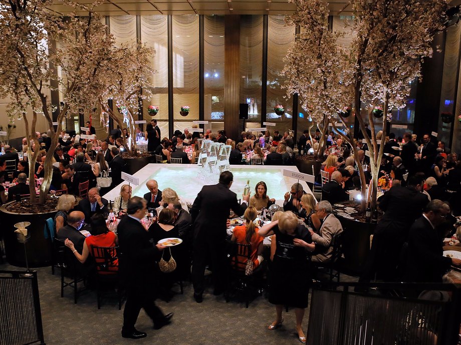 The architects built the restaurant with a "less is more" philosophy. Here, in the main dining room — known as The Pool Room — there are 20-foot ceilings and a white marble pool sitting in the center.