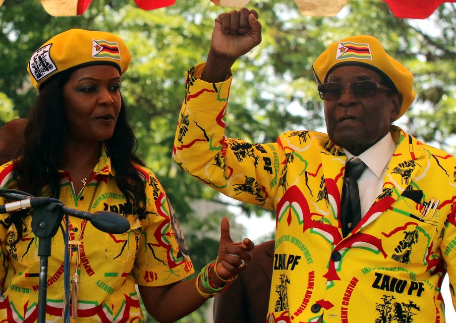 Robert Mugabe and his wife Grace pictured at a ZANU-PF rally on November 8.