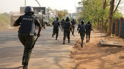 Nigerian Police officers on the run (Illustraton - NewDawnNigeria)