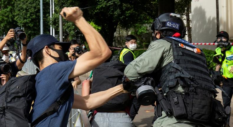 A man has been arrested on suspcion of stabbing a police officer during protests