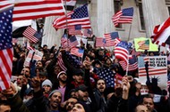 Demonstrators participate in a protest by the Yemeni community against U.S. President Donald Trump's