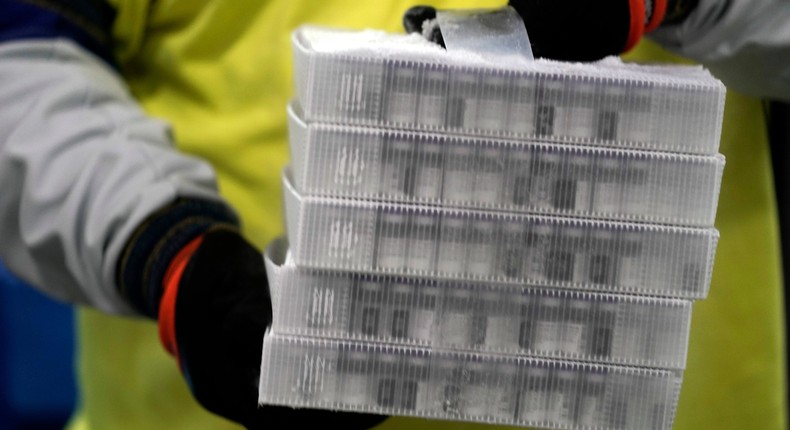 Boxes containing the Pfizer-BioNTech COVID-19 vaccine are prepared to be shipped at the Pfizer Global Supply Kalamazoo manufacturing plant in Portage, Michigan on Sunday, December 13, 2020.