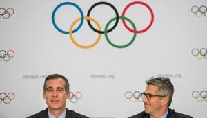 Los Angeles mayor Eric Garcetti (left) and LA 2028 chaiman Casey Wasserman (R) speak to the press in Lausanne, Switzerland, in July 2017