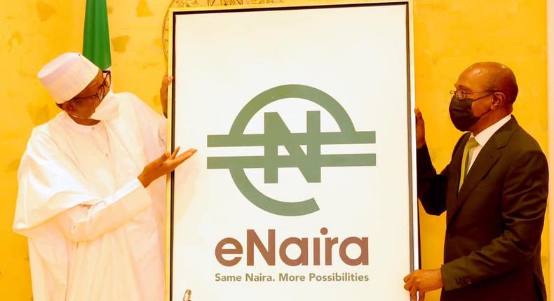 L-R: President Muhammadu Buhari; and CBN Governor, Godwin Emefiele at the launch of e-Naira [Presidency]