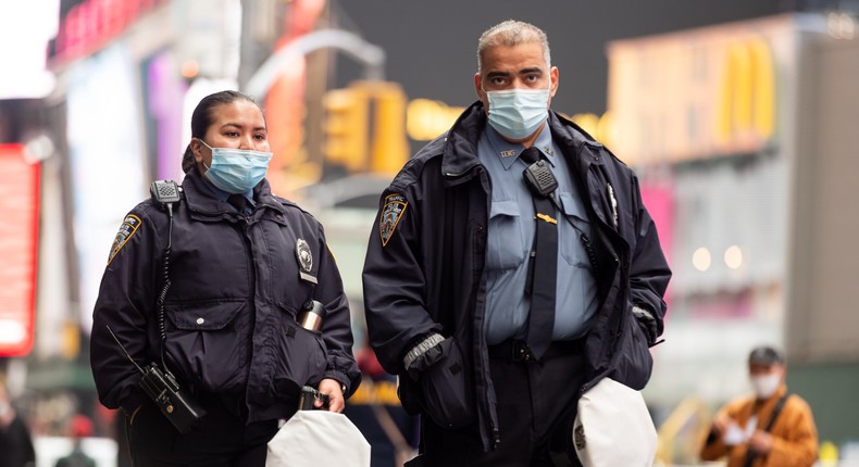 NYPD officers wear face masks in Times Square.