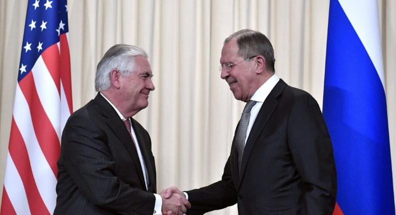 Russian Foreign Minister Sergei Lavrov (R) shakes hands with US Secretary of State Rex Tillerson after a press conference in Moscow on April 12, 2017