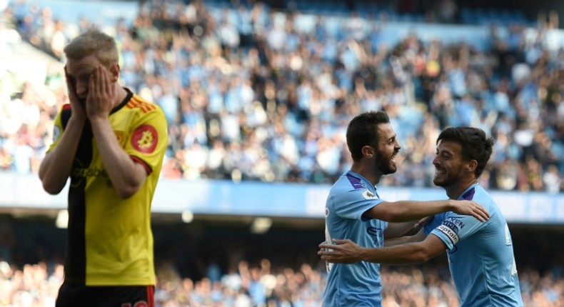 Manchester City's Bernardo Silva (C) celebrates a goal in his side's rout of Watford