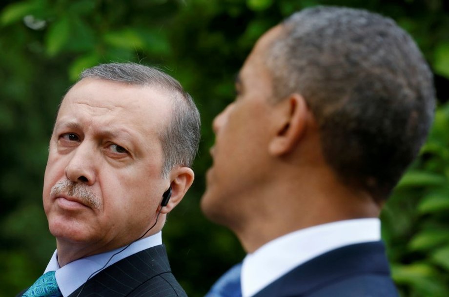 Turkish Prime Minister Erdoğan listens as US President Barack Obama addresses a joint news conference at the White House in Washington, DC.