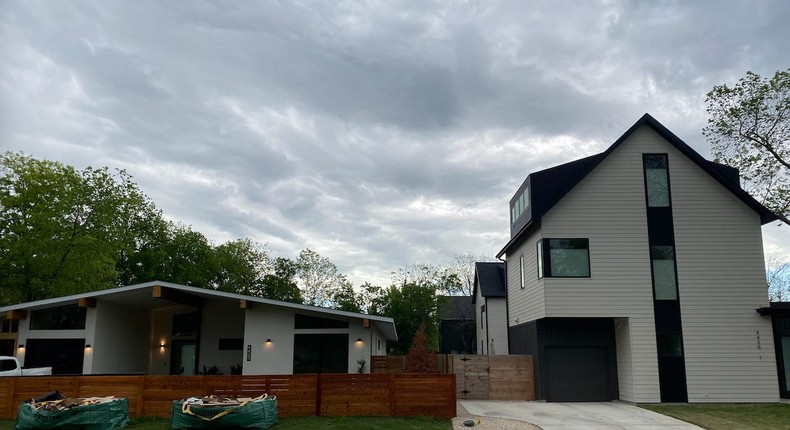 A five-bedroom single-family home, left, and one of four smaller homes built on a similar lot in Austin.Eliza Relman/Business Insider