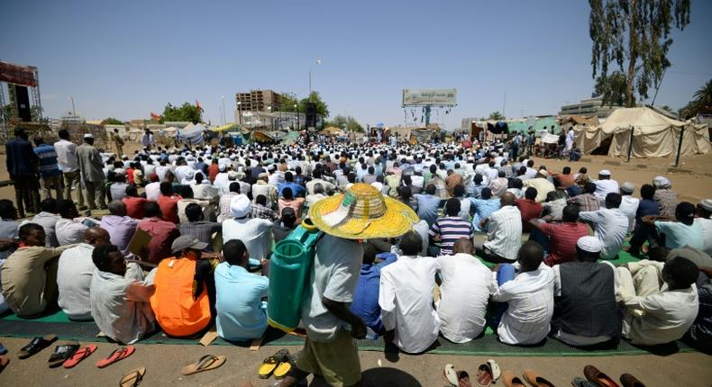 Sudanese protesters, attending Friday prayers near the military headquarters, have kept a sit-in at the site for weeks