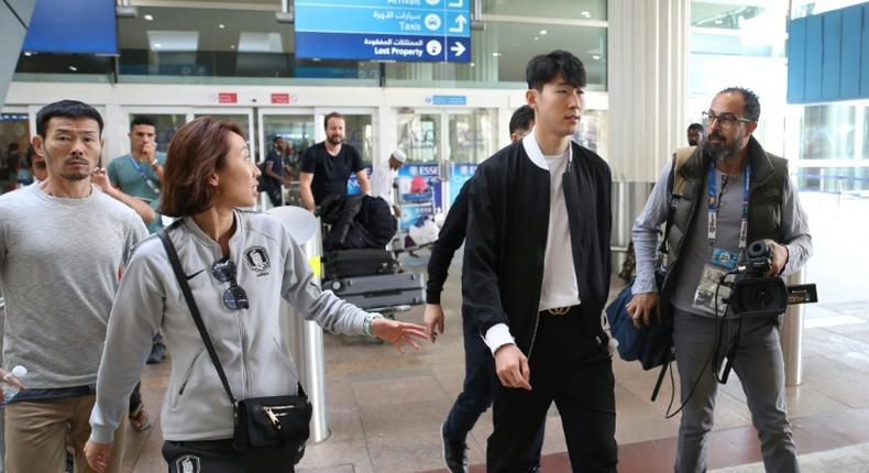 Son Heung-min (2-R) arrived in Dubai after playing in Tottenham's 1-0 loss to Manchester United on Sunday