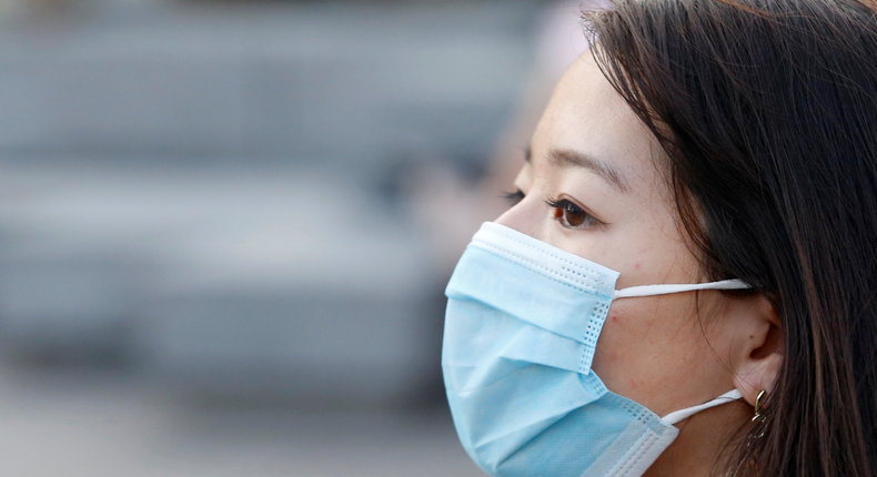 A woman wearing a face mask