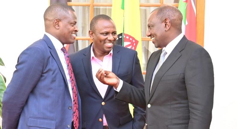 File image of President William Ruto sharing light moments with Majority leader Kimani Ichung'wah and Kiharu MP Ndindi Nyoro at State House, Nairobi.