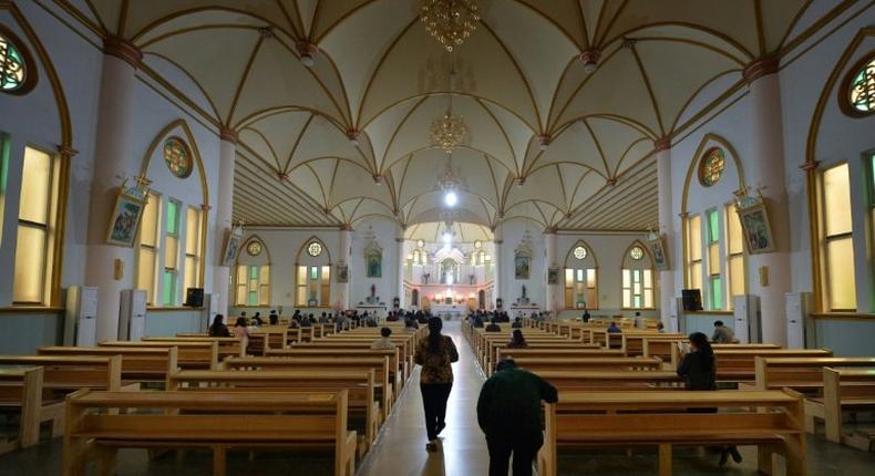 Millions of Chinese Catholics, like these in Donglu, are outside the fold of the Communist Party's Chinese Catholic Patriotic Association