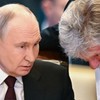 Vladimir Putin i Dmitrij Peskov