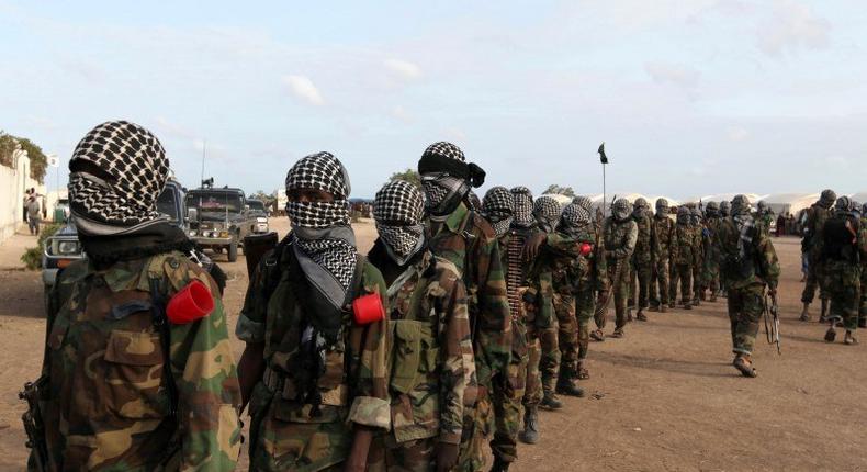 Members of al Shabaab parade at Ala Yaasir camp, outside of Somalia's capital Mogadishu, September 3, 2011. REUTERS/Feisal Omar