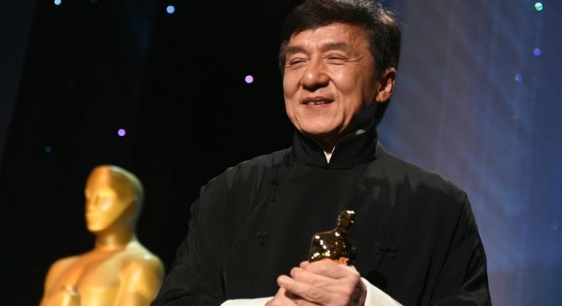 Jackie Chan poses with his Honorary Oscar Award during the 8th Annual Governors Awards in Hollywood, California