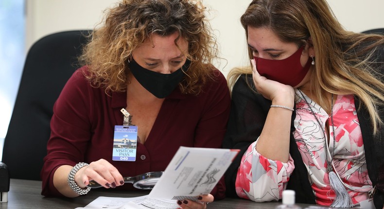 In some states, election officials use a signature match to ensure the authenticity of an absentee ballot.Joe Raedle/Getty Images