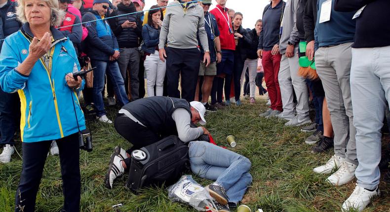 A female spectator was hit in the head by a golf ball hit by American player Brooks Koepka at the Ryder Cup on Friday.