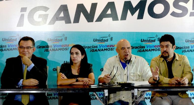 Roberto Marrero (R), pictured with other Venezuelan opposition figures in 2015, was detained by state intelligence officers, the opposition alleged