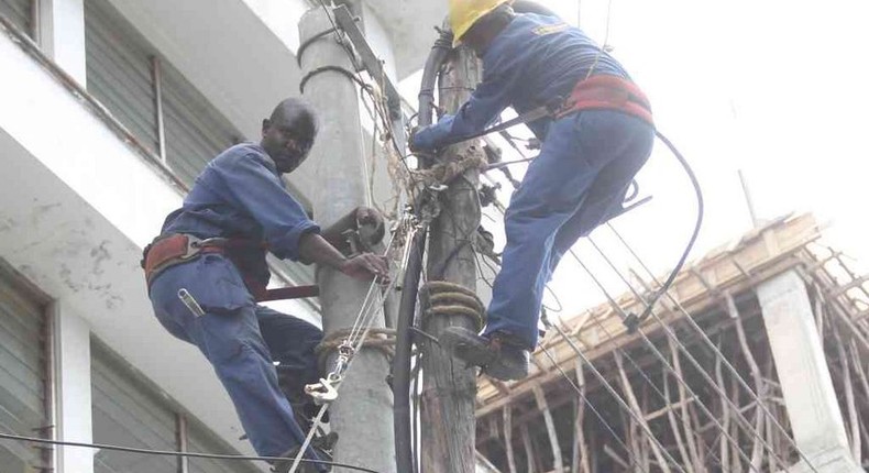 Kenya Power workers during a past maintenance procedure  