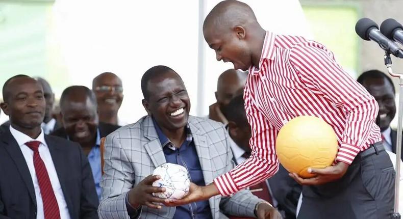 [FILE] Former FKF President Nick Mwendwa (in pink) meets President elect William Ruto in a past function
