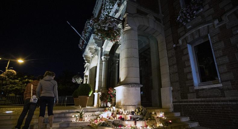 Makeshift memorial for the late priest