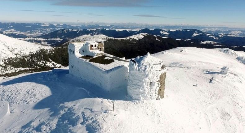 View of Bilyi Slon, or the White Elephant, the highest inhabited building in Ukraine and an old astronomical observatory on Chornogora mountain, near the village of Vorokhta, on March 9, 2017