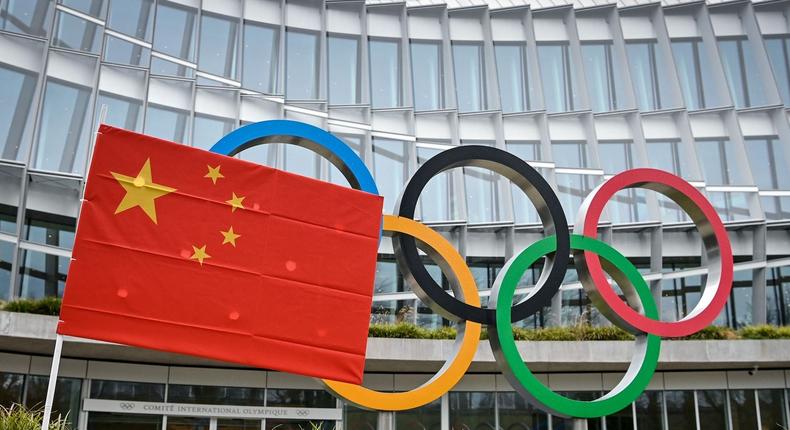 A Chinese flag flutters in front of the IOC headquarters during a protest by activists of the International Tibet Network against the Beijing 2022 Winter Olympics on Februay 3, 2021 in Lausanne.
