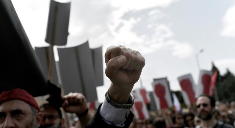 Greek trade unions mark May Day with a 24-hour nationwide strike and protests against looming new cuts