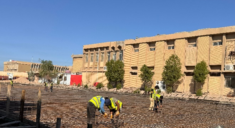 Source Shutterstock – Construction workers at a development site in Basra, 2023