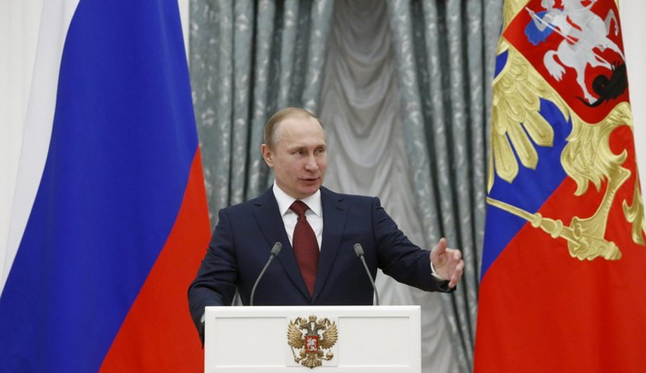Russian President Putin delivers a speech during a ceremony to award the Hero of Labor at the Kremlin in Moscow