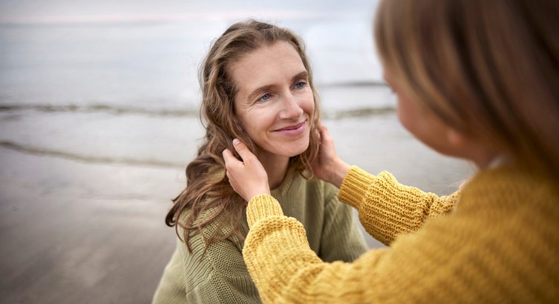 A mother smiles at her daughterOliver Rossi/Getty Images