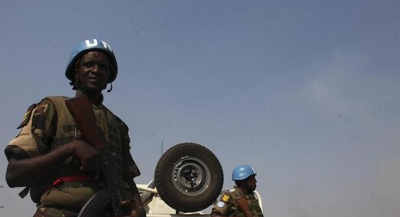 Rwandan UN peacekeepers patrol in a neighbourhood in Juba January 20, 2014. 