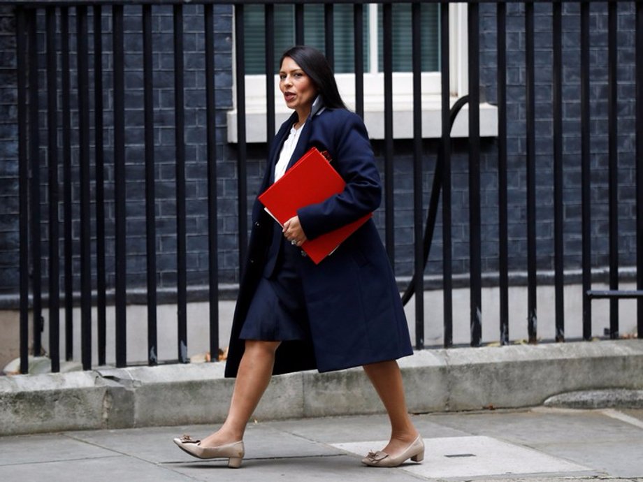 arrives in Downing Street, in London