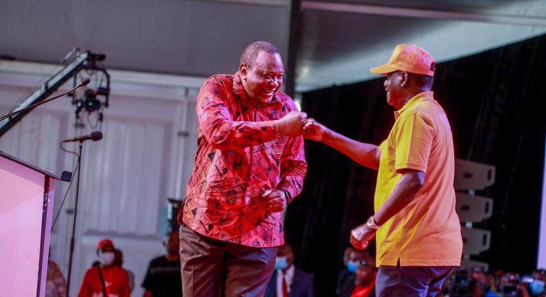 Former president Uhuru Kenyatta with ODM leader Raila Odinga at the Jubilee National Delegates Conference